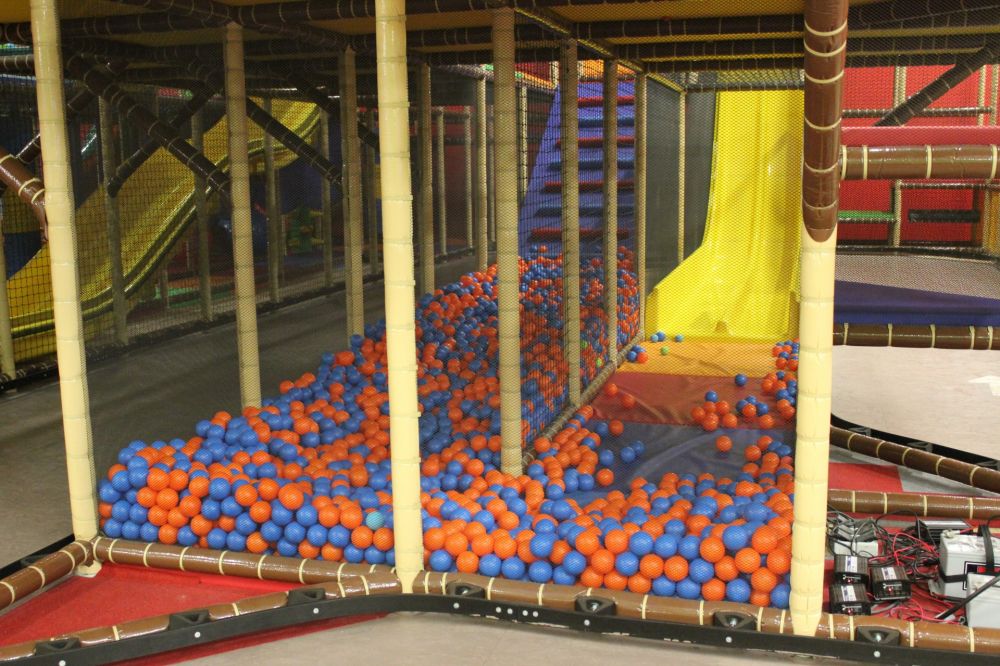 Plastic balls pool with yellow slides